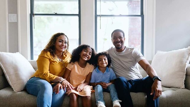 Happy family on couch
