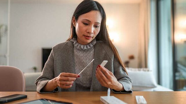 Women taking Covid-19 test at home