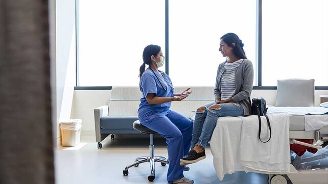 Patient talking to ED provider