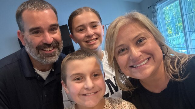 Emily with her parents, Kevin and Jamie, along with Emily's sibling.