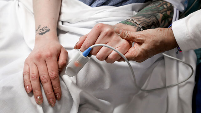 An IV in the arm of a patient.