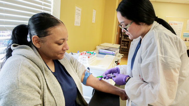 Phlebotomist training program students in session.