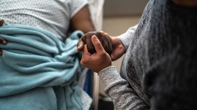 Hands of person in hospital