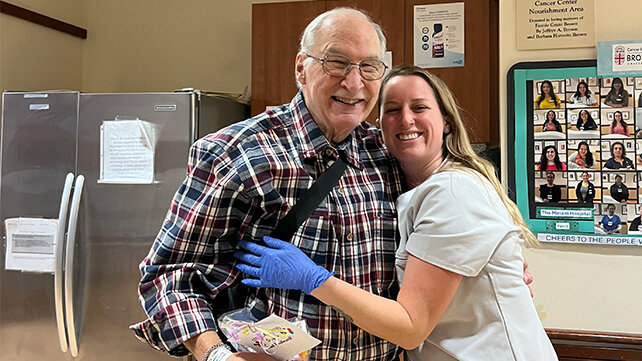 Grateful patient Biz with nurse Megan