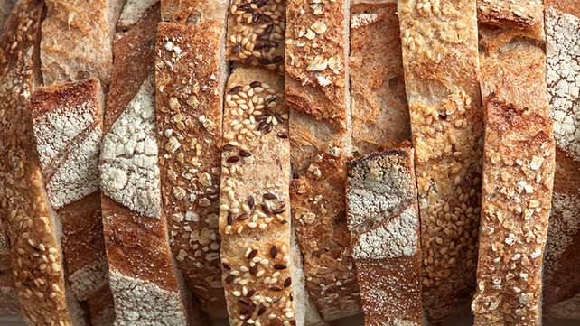 Gluten is a protein typically found in wheat, barley, and rye which are common in most breads.