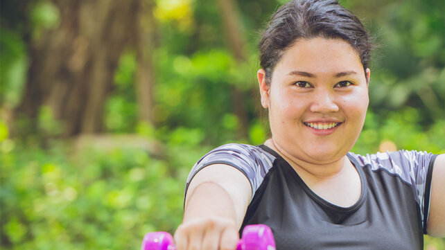 teen flexing a muscle