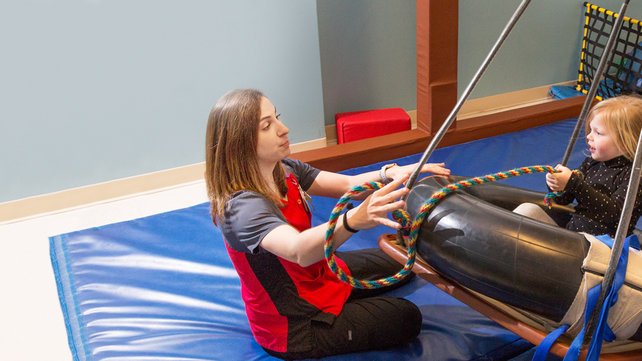 child receiving physical therapy