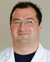 Headshot of Doctor Alexey Knyazhitskiy