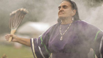 Carole dancing at a pow wow